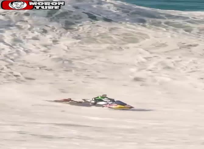 Video: Whoa, check out this lifeguard saving a surfer!